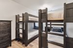 Two twin over twin bunk beds in bedroom 1